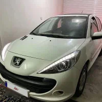پژو 207 پانا سقف شیشه 1401 بی رنگ عروسک