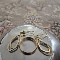 حدود ۶گرم طلا گوشواره و حلقه مردانه