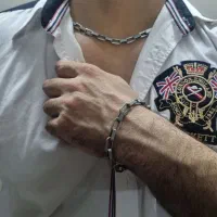 ست گردنبند و دستبند استیل مردانه طرح ورساچه