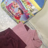 لباس فرم و کتاب مهد