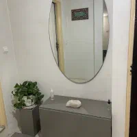 جا کفشی به همراه اینه و‌گلدان