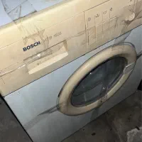 ماشین لباس شویی بوش.پنکه.کنار تخت.کمد.هود
