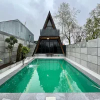 کلبه سویسی استخرروباز اب گرم  دو خوابه لوکس انزلی