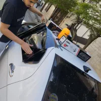 شیشه دودی ماشین واکس وپولیش بدنه سیار ودرب مغازه