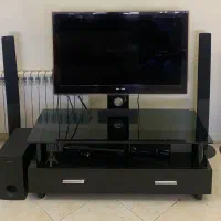 تلویزیون سامسونگ سری ۷ با سینمای خانگی و میز TV