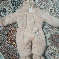 کاپشن سرهمی نوزاد