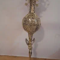 گلدان برنز کنار سالنی پایه فرشته