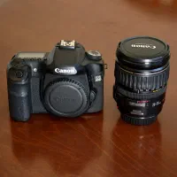 بدنه، لنز و کیف دوربین عکاسی Canon 40D + EF 28-135