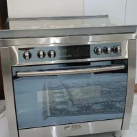 اجاق گاز فردار تمام استیل فول آپشن در حد نو