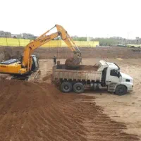 خاک برداری تخریب ساختمان بیل زنجیری و لاستیکی