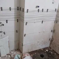 کارهای کاشی کاری و لوله کشی ساختمان