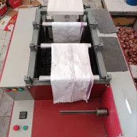 دستگاه رول کن سه کاره. فریزر. زباله. سفره