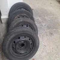 چهار حلقه لاستیک با رینگ آهنی یزد تایر
