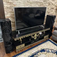 میز تلویزیون و دیوارکوب برنج