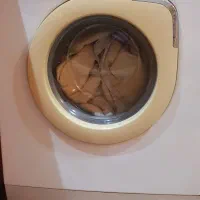 لباسشویی و میز تلوزیون