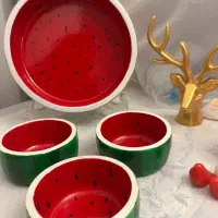 ظرفهای هندوانه مناسب شب یلدا با شمع انار مدل ترمه