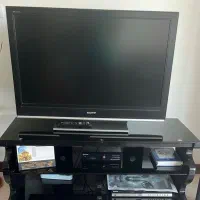 میز تلویزیون شیشه‌ای مشکی (سالم و تمیز