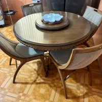 میز ناهارخوری ، ساعت ، بوفه و میز جلو مبل و ال سی