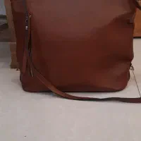 کیف مجلسی|کیف، کفش، کمربند|اصفهان, رکن الدوله شرقی|دیوار