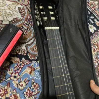 گیتار تمیز دست نخورده معاوضه هم میکنم