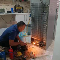 تعمیرات حرفه ای یخچال در منزل با ضمانت