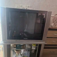 تلویزیون ۲۹ اینچ همراه با زیر تلویزیون