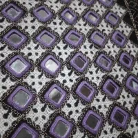 دوزنده ی آینه