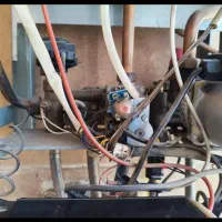 تعمیر و سرویس انواع پکیج دیواری و تصفیه اب|خدمات پیشه و مهارت|یزد, |دیوار