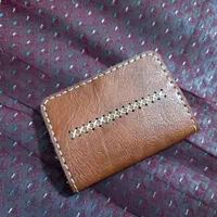 یک عدد کیف پول|کیف، کفش، کمربند|اقبالیه, |دیوار