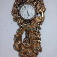 ساعت دیواری طلایی زیبا