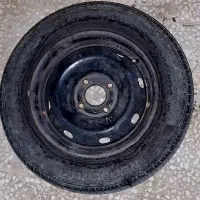 لاستیک و اگزوز و پشت سری صندلی