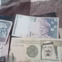چنداسکناس خارجی وطنی به. همراه  سنگ سکه،و1 نقره