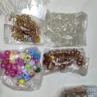 مقداری مروارید و دریم کچر و گل خشک برای رزین و...
