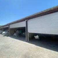 دهنه گاراژ تعمیرگاه غرفه