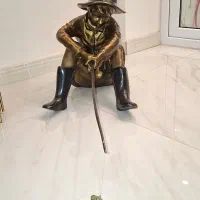 مجسمه پسرک ماهیگیر