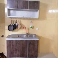 سینک دوقلو، کابینت و آبچکان همگی در حد نو