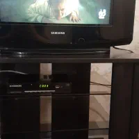 تلویزیون ومیز ودستگاه دی2جیتال