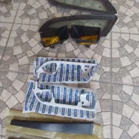 شیشه لچکی . مه شکن پژو.قاب ستون و ابرو چراغ پراید