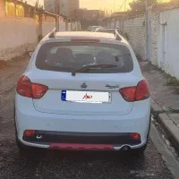 کوییک سفیدوقرمز|خودرو سواری و وانت|تهران, مشیریه|دیوار