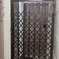 درب حفاظ آکاردئونی ونرده|مصالح و تجهیزات ساختمان|زنجان, |دیوار