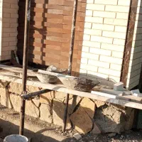 اجرای آجرنمای چسپی دوغابی