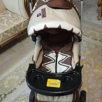 کالسکه کرم قهوه ای