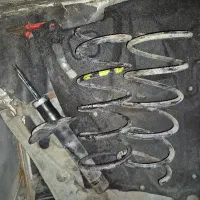 یک جفت فنر و یک عدد کمک پژو