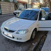 مزدا۳۲۳ سفید سالم تیپ ۵ سانروف