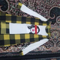 تعدادی لباس نو|لباس|فردوس (خراسان), |دیوار