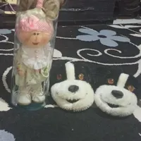 یه جفت کفش و عروسک روسی