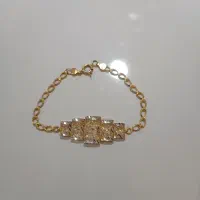 سه گرم  و نیم طلا .گرمی ۲۲