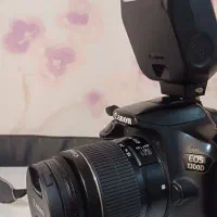 دوربین 1300D همراه با فلاشر