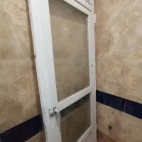 درب آلومینیومی با شیشه دوجه داره