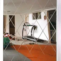 آینه دکوراتیو با قاب دور آینه